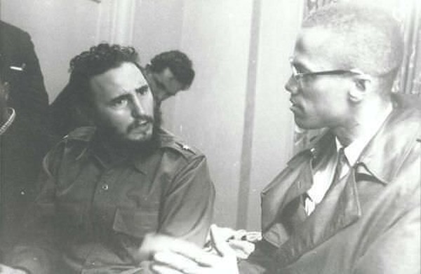 Fidel Castro and Malcolm X discussing politics and family - 1960