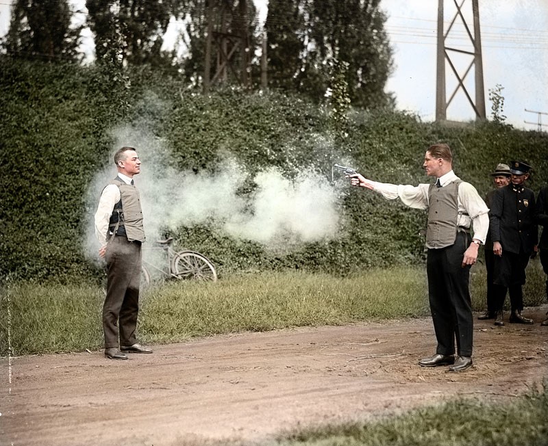 W.H. Murphy testing the bulletproof vest in 1923
