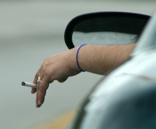 smoking-hand-out-car-window
